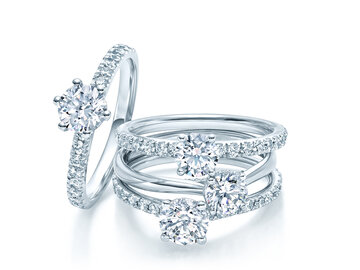 Pavéringe: großer Hauptstein und kleine Diamanten rundherum