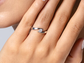 Verlobungsring Twist in 14K Gelbgold mit Diamant 0,25ct G/SI