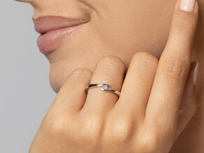 Verlobungsring Twist in 9K Roségold mit Diamant 0,03ct